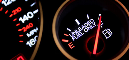 fuel gauge on dashboard indicating a full tank