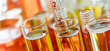 oils in test tubes with pipette