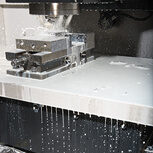 machine image of slideway with liquid dripping down
