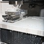 machine image of slideway with liquid dripping down