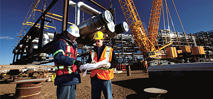 two engineers having an onsite discussion
