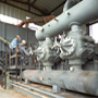 2 engineers on a gas compressor