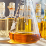 beaker with yellow oil
