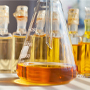 beaker with yellow oil