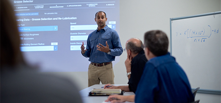 engineer teaching in conference room