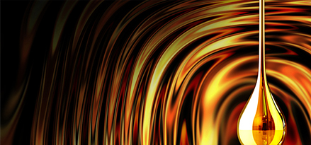oil drop with ripples in background